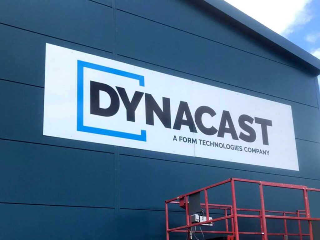 Dynacast ACM Building Sign onto cladded wall