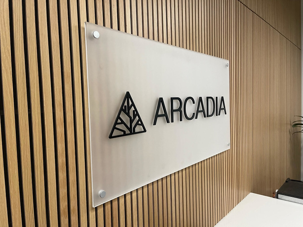 raised black acrylic logo - Reception Signs